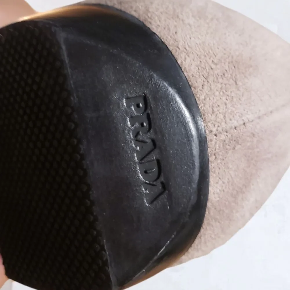 Prada minor runs scratches